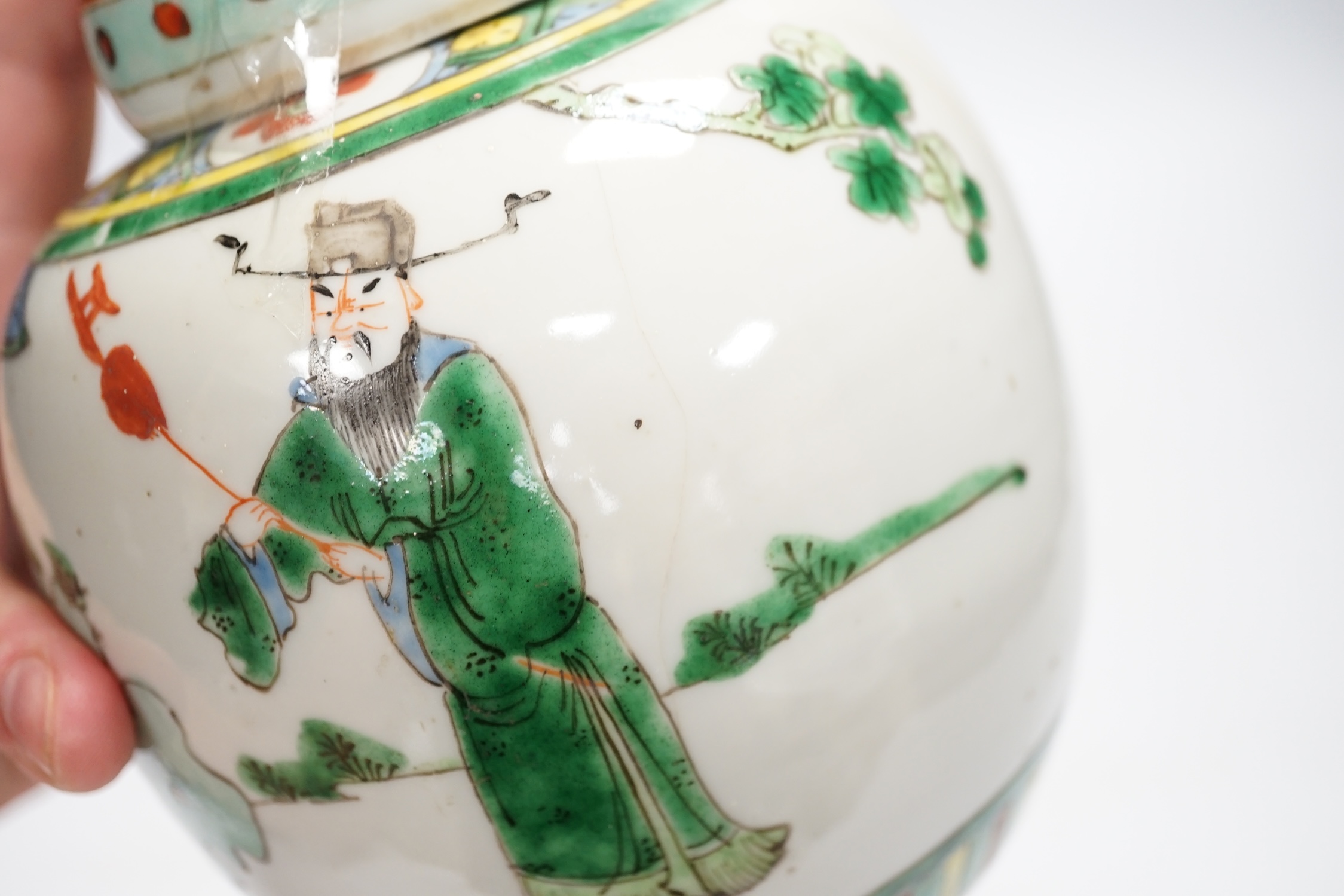Chinese ceramics to include a crackleware vase and a blue and white vase, a jar and cover and a rice bowl, tallest 20cm high. Condition - all items damaged, overall poor